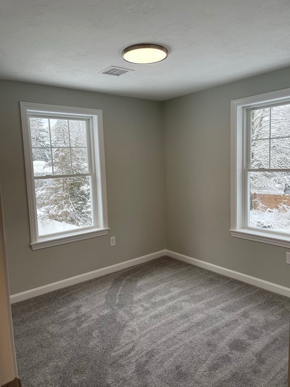 30 Markham Circle Ayer, MA 01432 - Photo 16 of 22 an empty room with a window