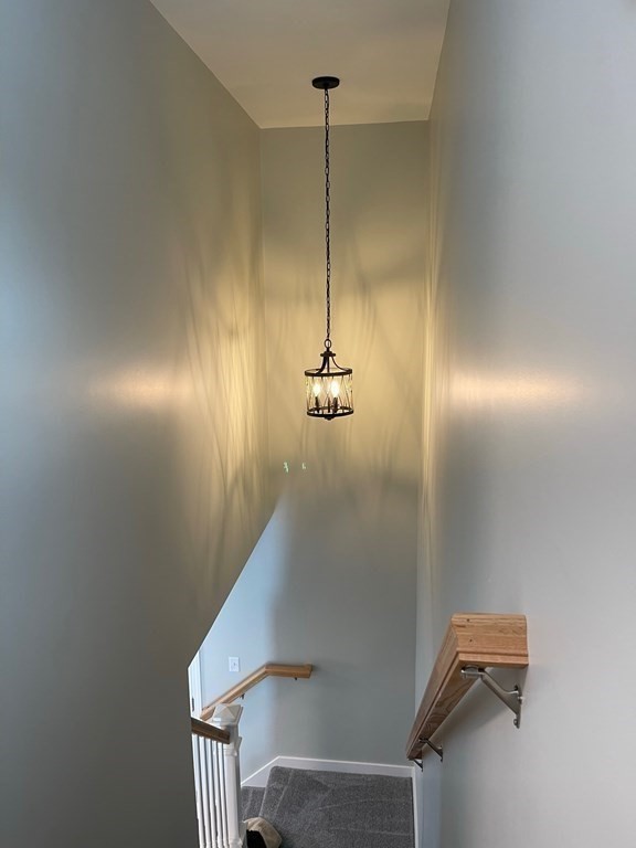 30 Markham Circle Ayer, MA 01432 - Photo 18 of 22 a view of a hallway with closet