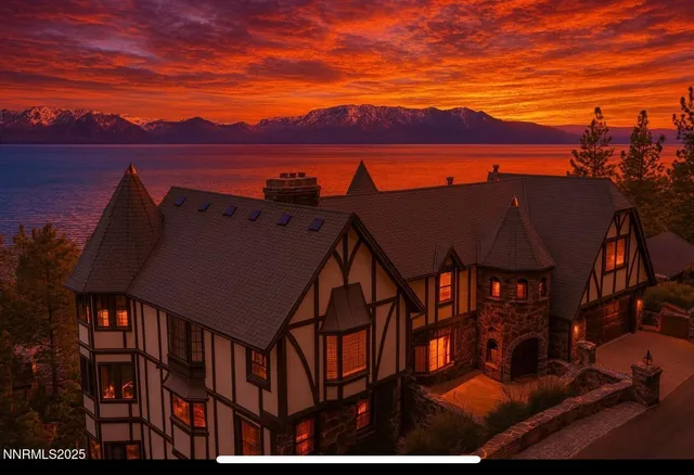 a view of a patio with a table and chairs