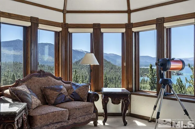 a view of a balcony with chairs