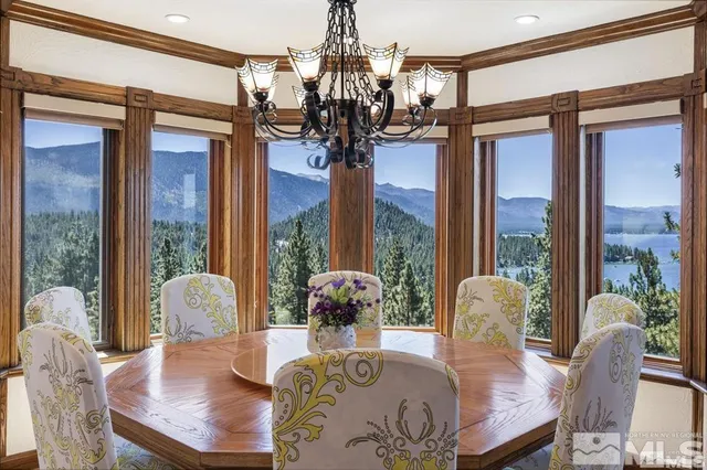 a lobby with furniture and a glass door