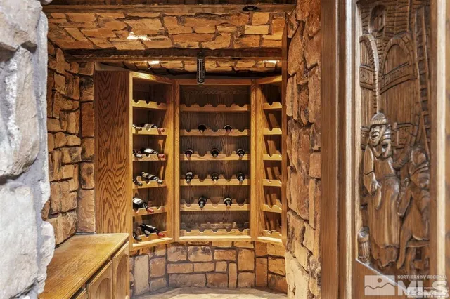 a kitchen with sink stove and refrigerator