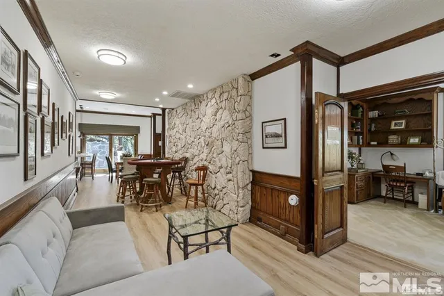 a front view of a house with yard porch and furniture