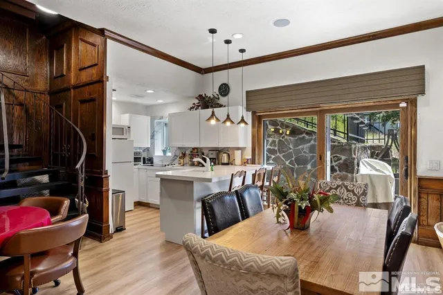 an outdoor view of the house and trees around