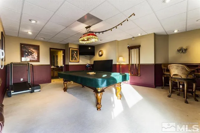 a view of a big house with a street