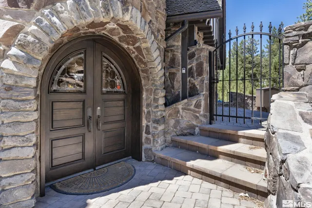 a kitchen with a table and chairs