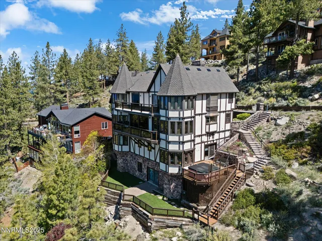 a view of a city with mountains in the background