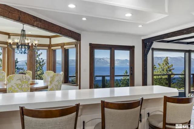 a kitchen with a sink and a potted plant