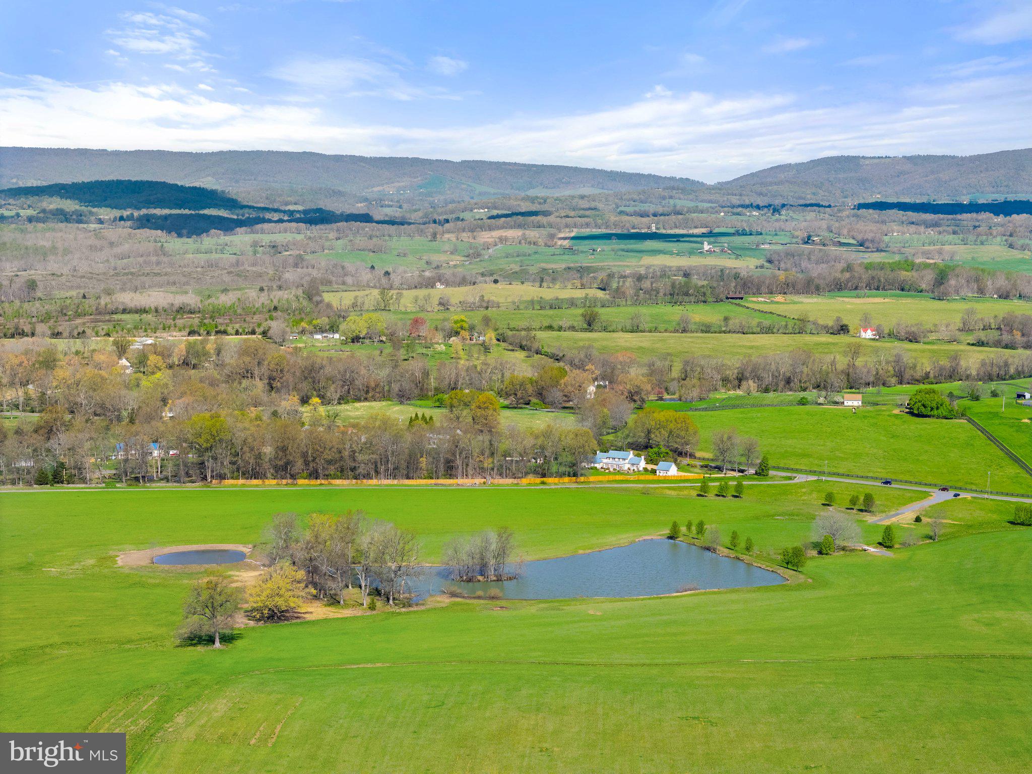 Atoka Road Marshall, VA 20115 - Photo 14 of 26 a view of a lake with houses