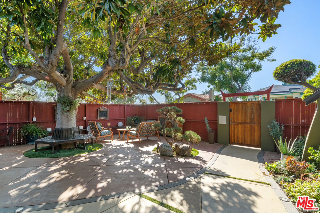 5008 Valley Ridge Avenue View Park, CA 90043 - Photo 4 of 28 a backyard of a house with lots of green space