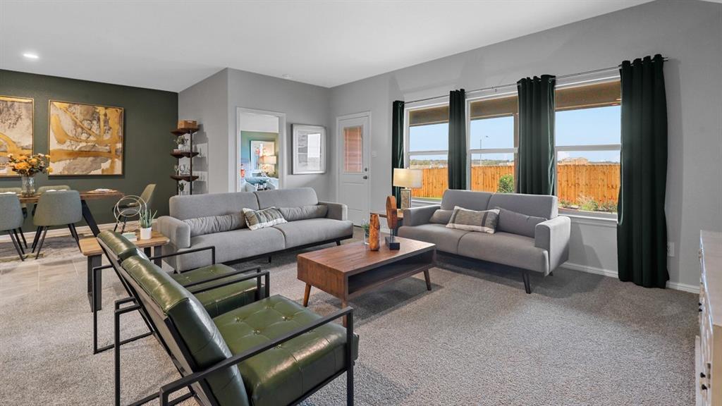 16417 Rangerville Drive Justin, TX 76247 - Photo 11 of 39 a living room with furniture and large windows