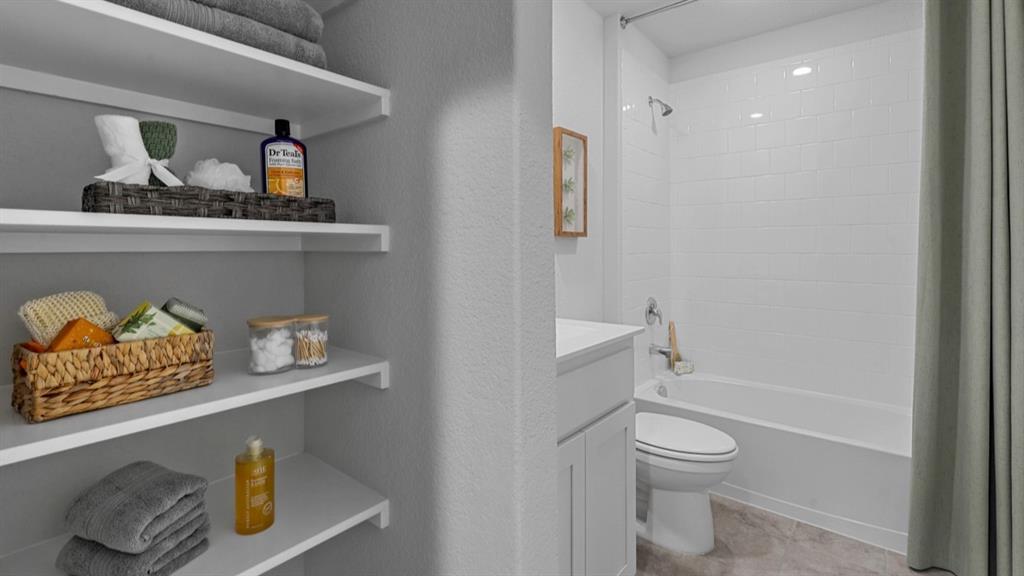 16417 Rangerville Drive Justin, TX 76247 - Photo 27 of 39 a bathroom with a toilet