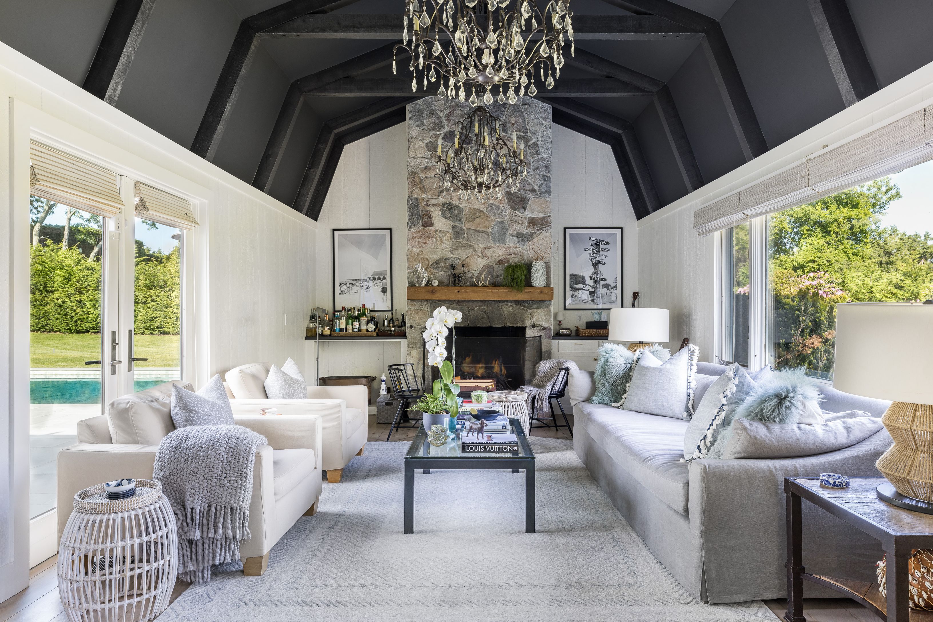 254 Water Mill Water Mill, NY 11976 - Photo 3 of 15 a living room with furniture a fireplace and a large window