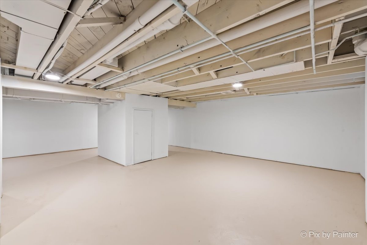 3019 Lincoln Road McHenry, IL 60051 - Photo 21 of 28 a view of a room with racks on the wall