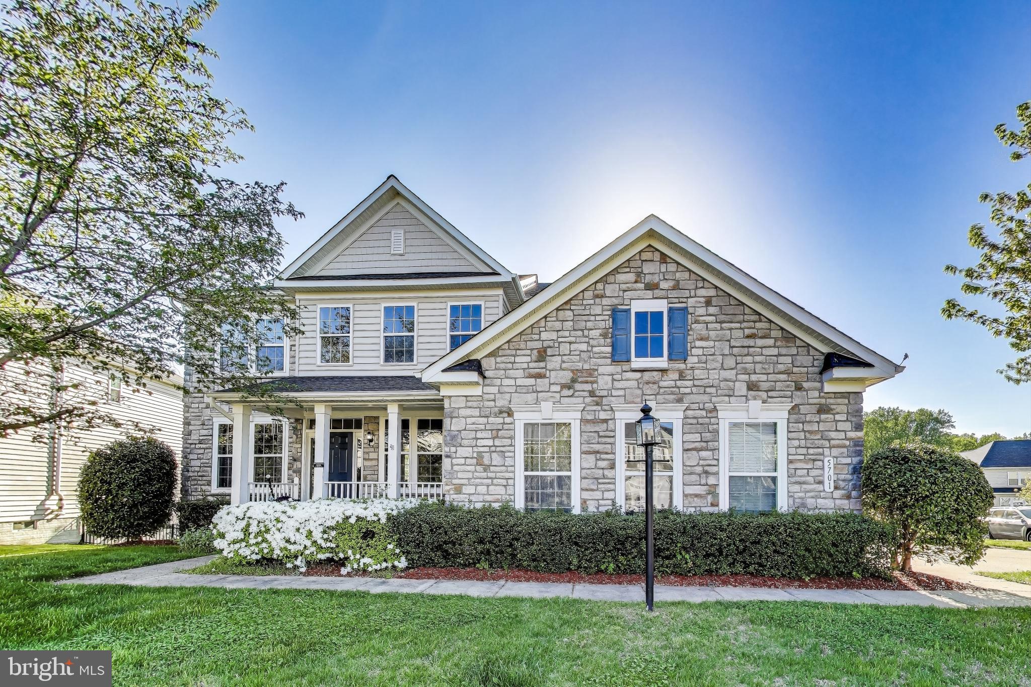 5701 Wink Way Woodbridge, VA 22193 - Photo 1 of 45 a front view of a house with a yard