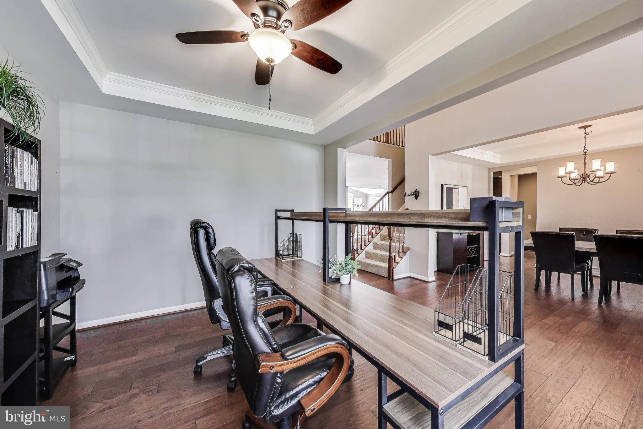5701 Wink Way Woodbridge, VA 22193 - Photo 15 of 45 a view of a workspace with furniture window and wooden floor