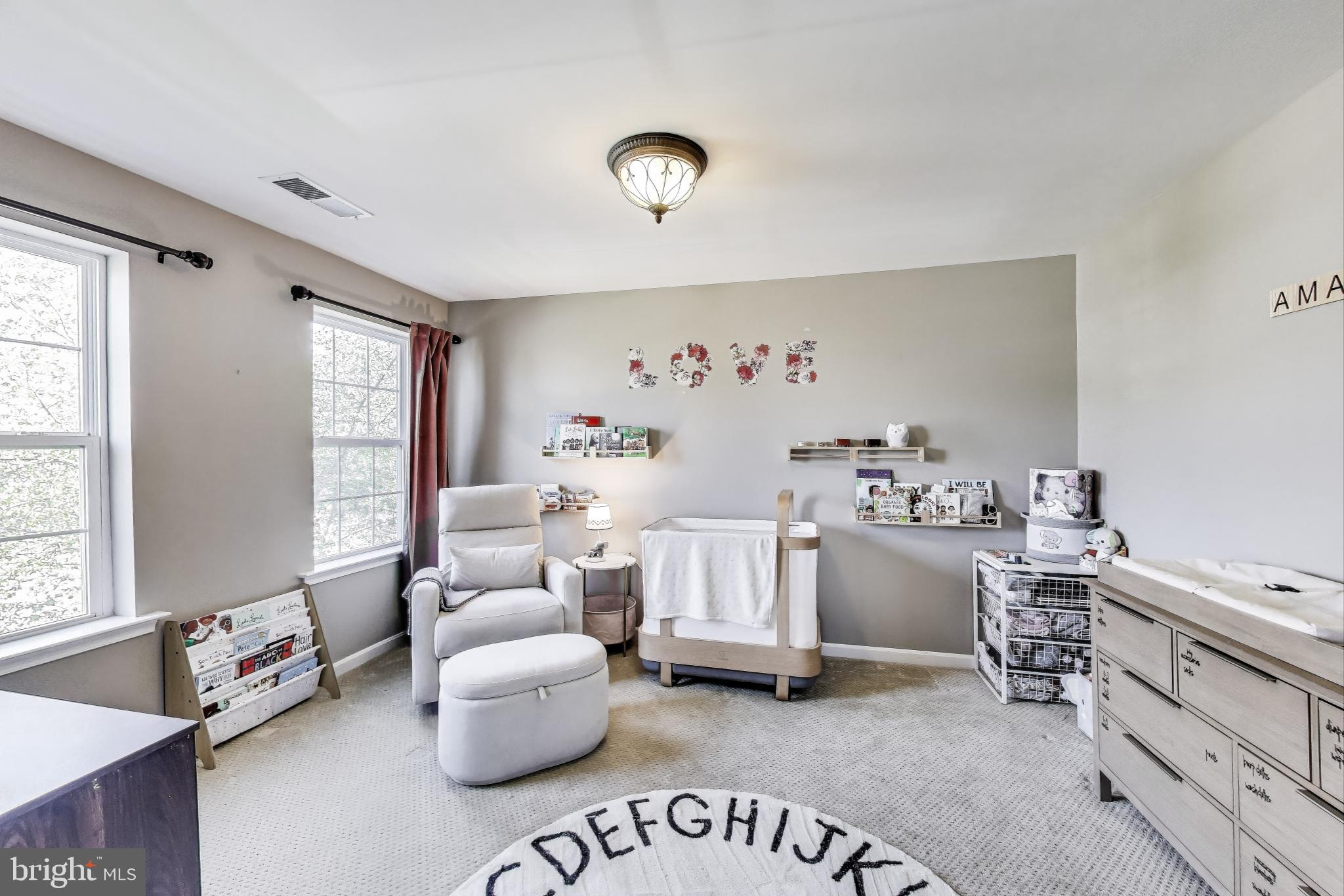 5701 Wink Way Woodbridge, VA 22193 - Photo 22 of 45 a bedroom with furniture and a window
