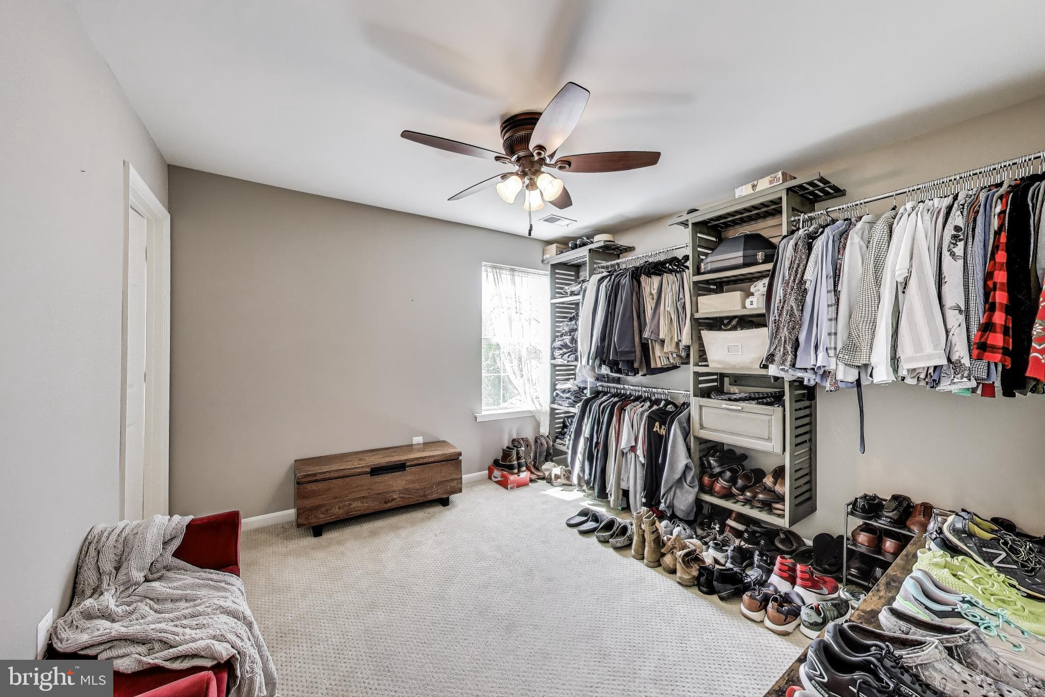 5701 Wink Way Woodbridge, VA 22193 - Photo 31 of 45 a view of walk in closet with clothes and shoes