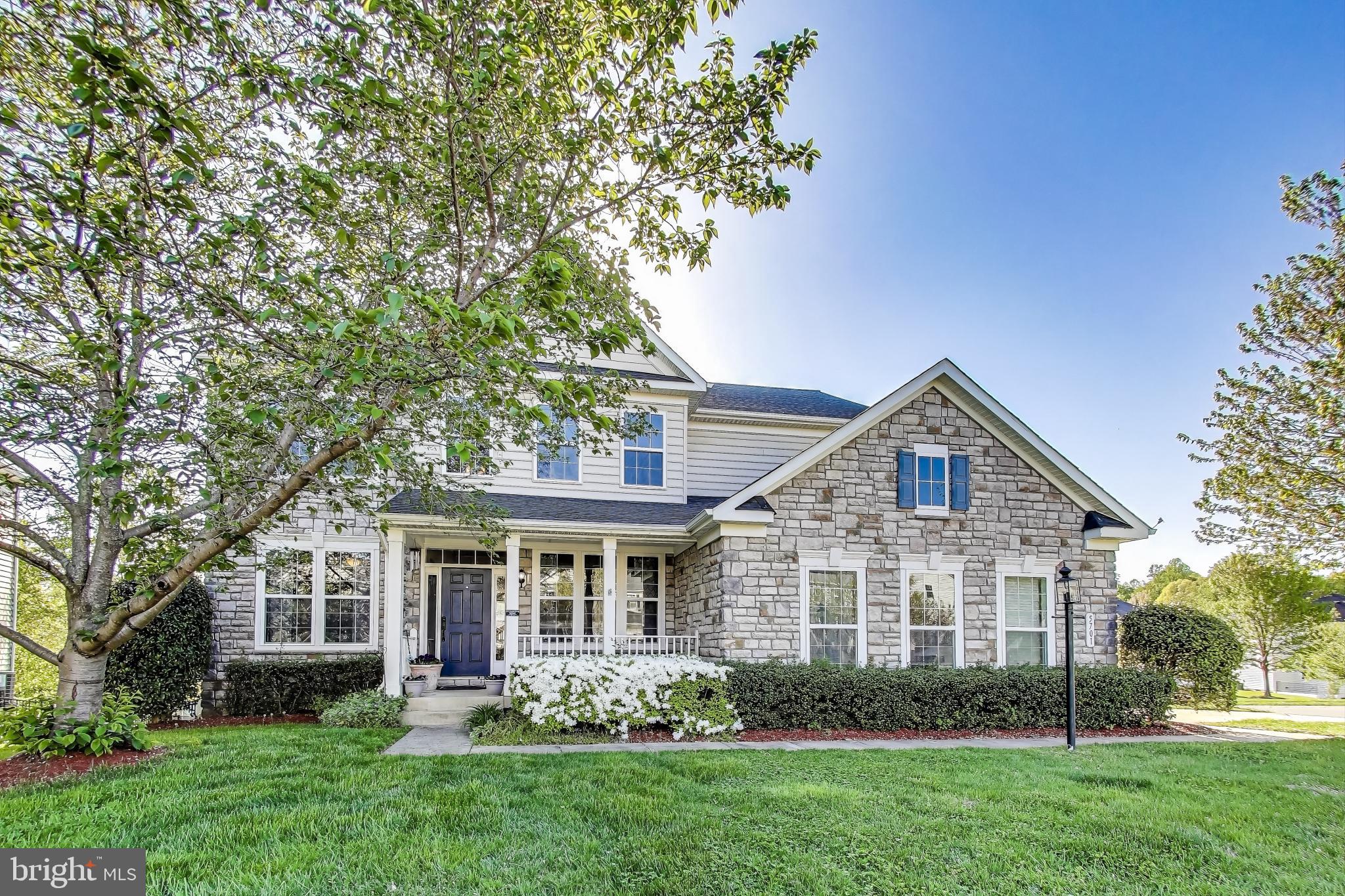 5701 Wink Way Woodbridge, VA 22193 - Photo 39 of 45 a front view of a house with garden