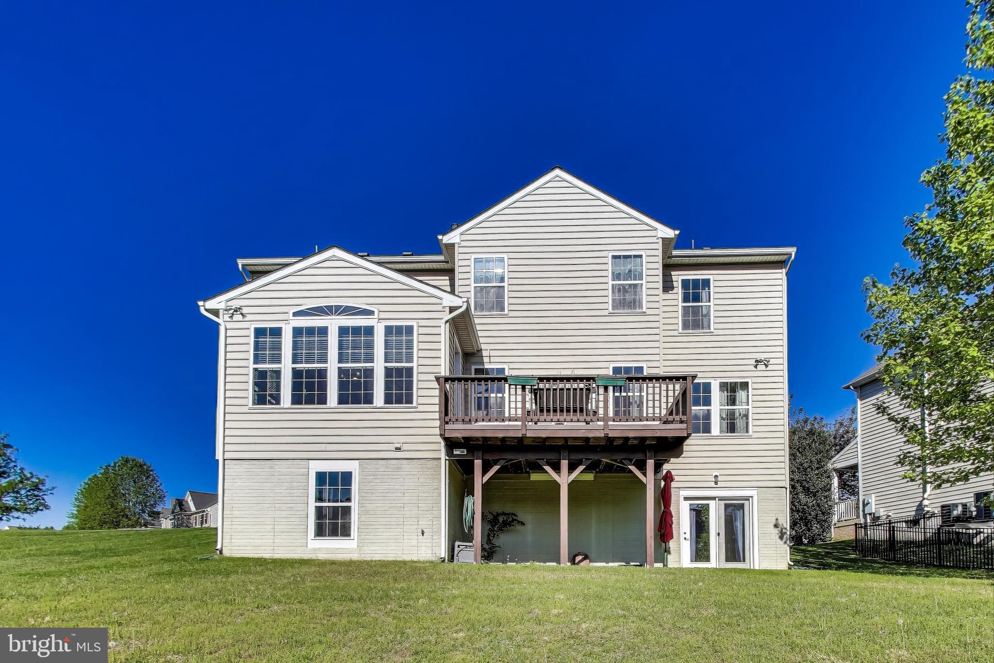 5701 Wink Way Woodbridge, VA 22193 - Photo 43 of 45 a view of a house with a yard