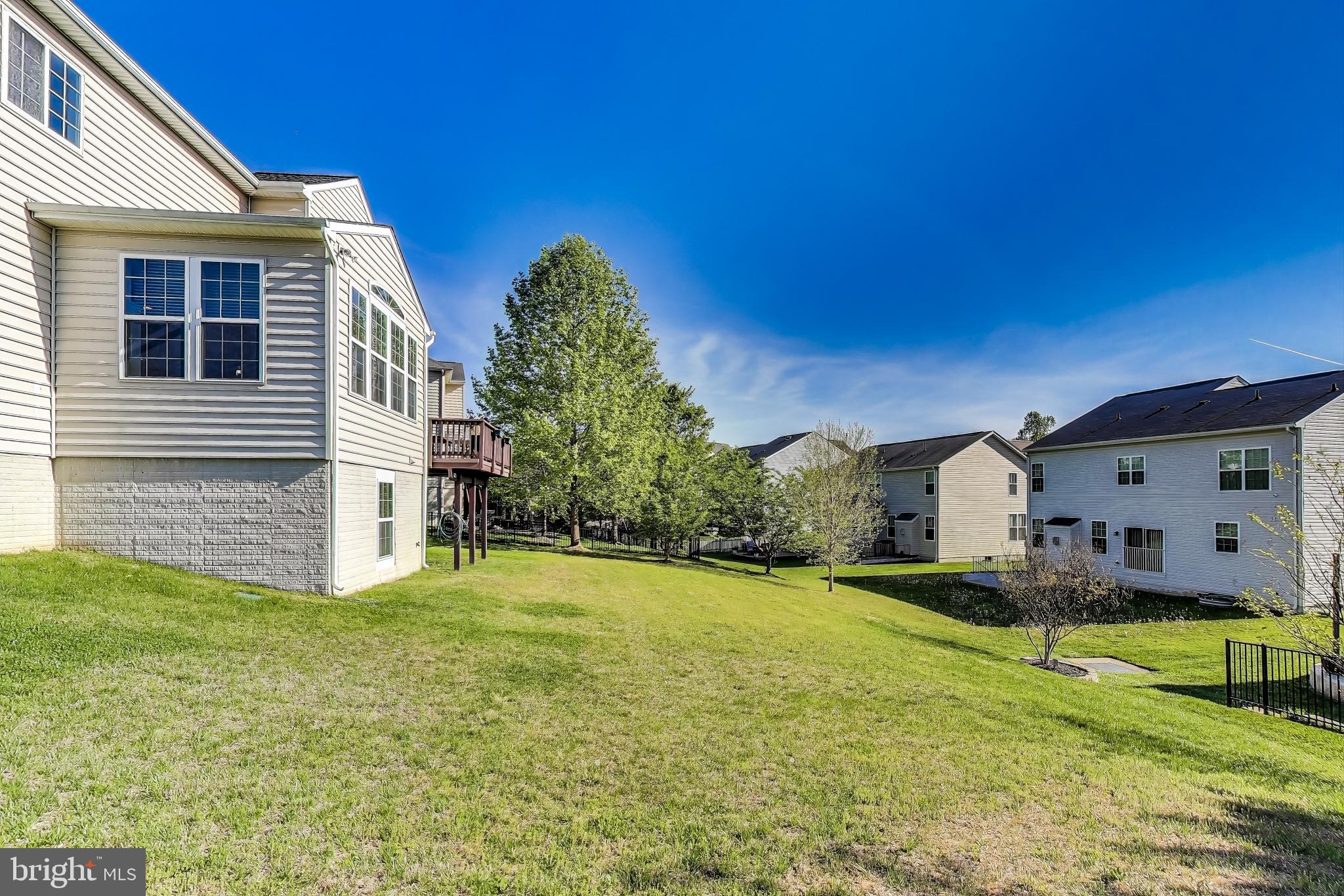 5701 Wink Way Woodbridge, VA 22193 - Photo 44 of 45 a view of a house with a big yard