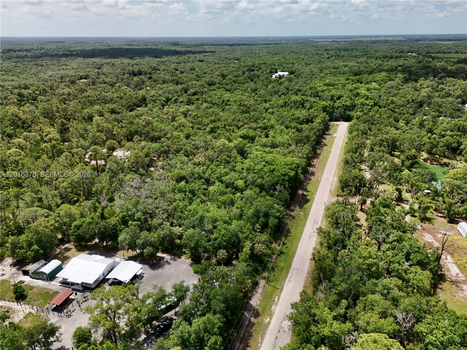 0 Southwest Gator Trail Arcadia, FL 34266 - Photo 7 of 21 an aerial view of residential house with outdoor space
