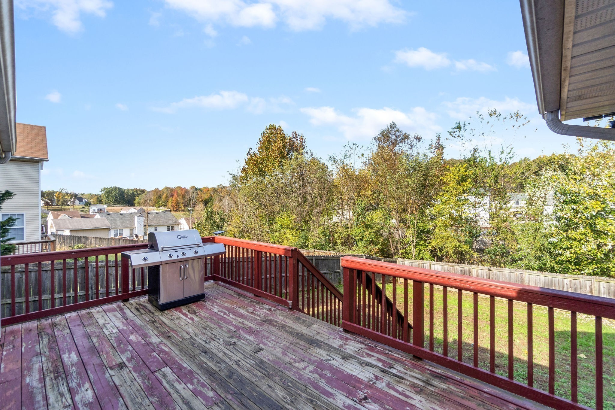 417 McMurry Road Clarksville, TN 37042 - Photo 7 of 9 a view of roof deck with wooden floor and fence