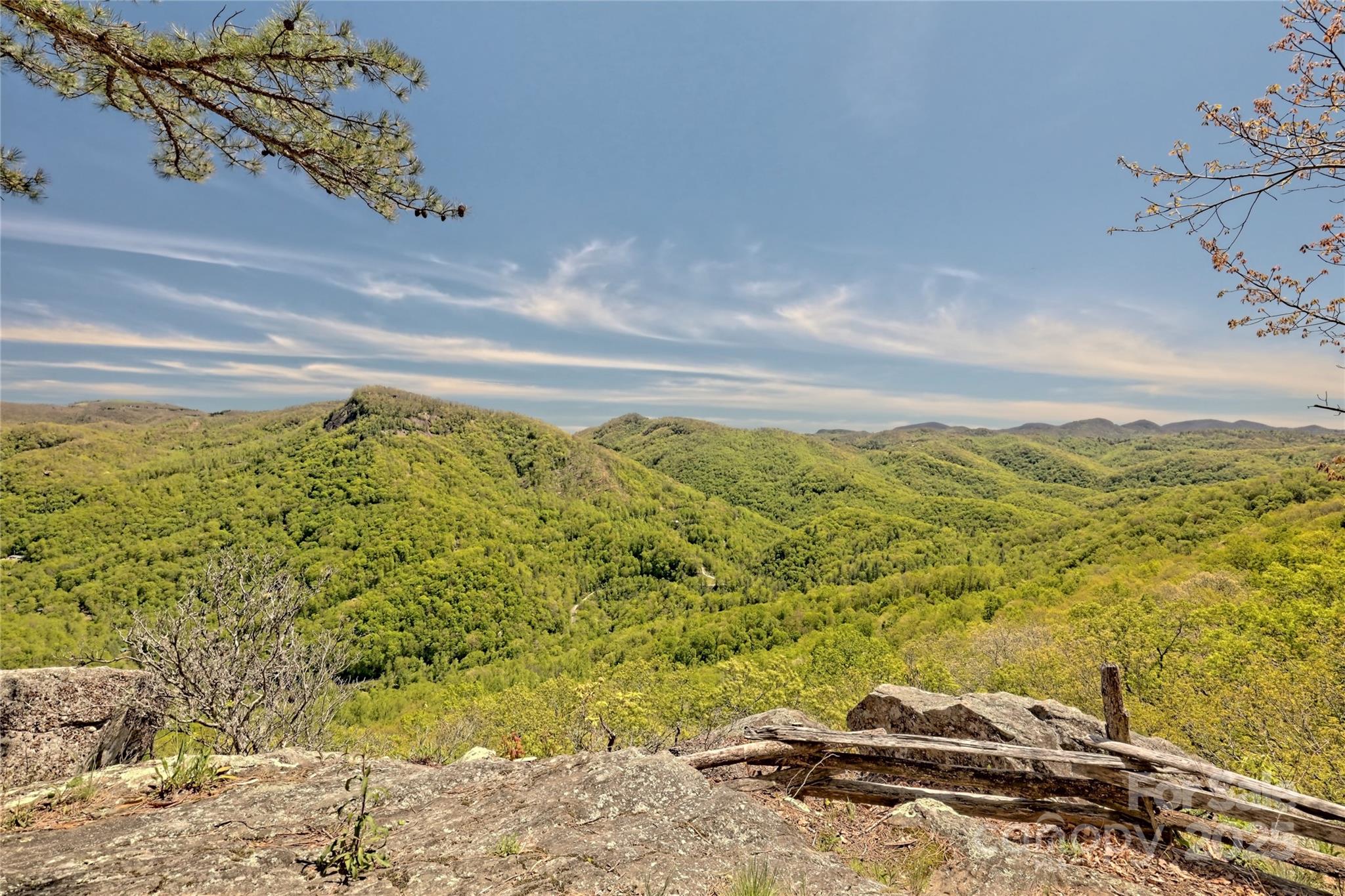 Lot 13 Hares Ear Lane, Unit 13 Cullowhee, NC 28723 - Photo 19 of 23 a view of a lake with a mountain