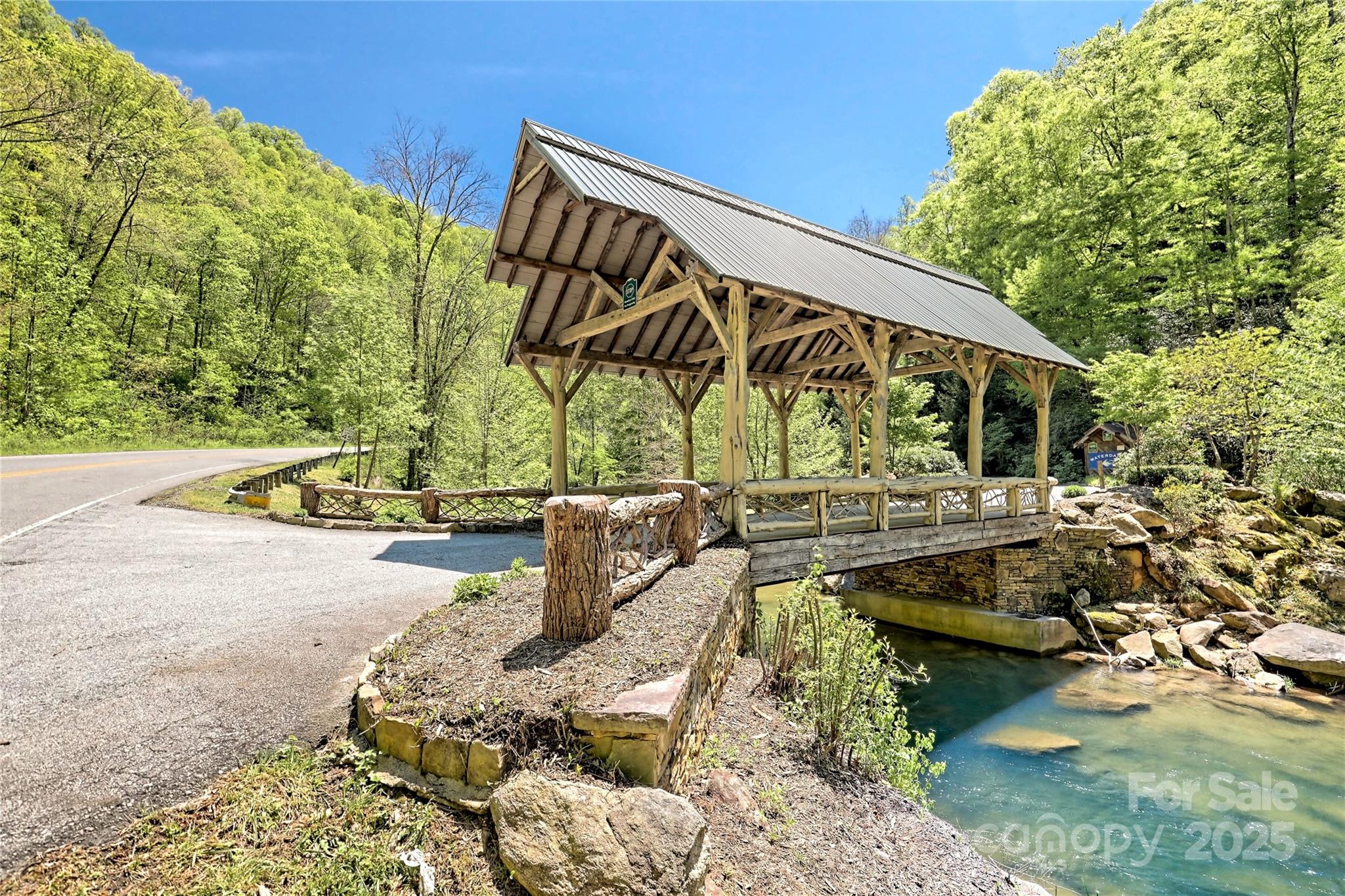 Lot 13 Hares Ear Lane, Unit 13 Cullowhee, NC 28723 - Photo 9 of 23 a view of swimming pool with a patio