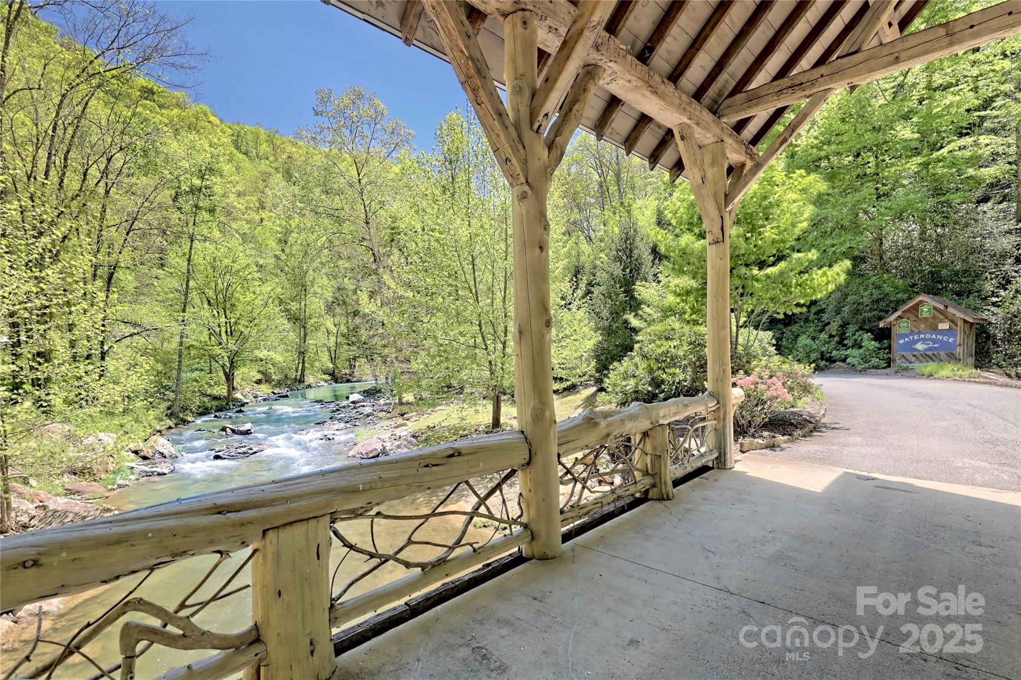 Lot 13 Hares Ear Lane, Unit 13 Cullowhee, NC 28723 - Photo 10 of 23 a view of a pathway with a yard