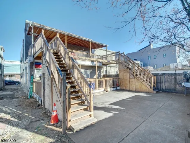 a view of a building with a porch