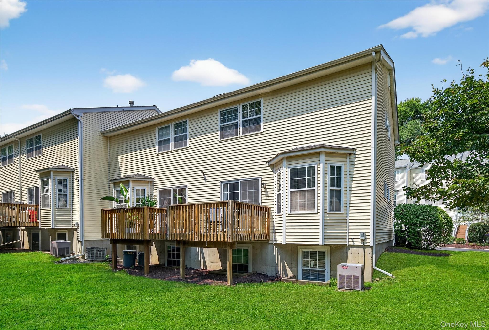 1 Lake Ridge Drive Middletown, NY 10940 - Photo 39 of 44 a view of a house with a backyard