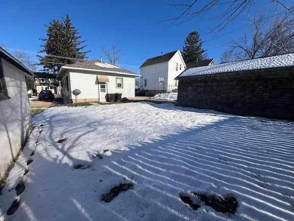 a view of a house with a patio
