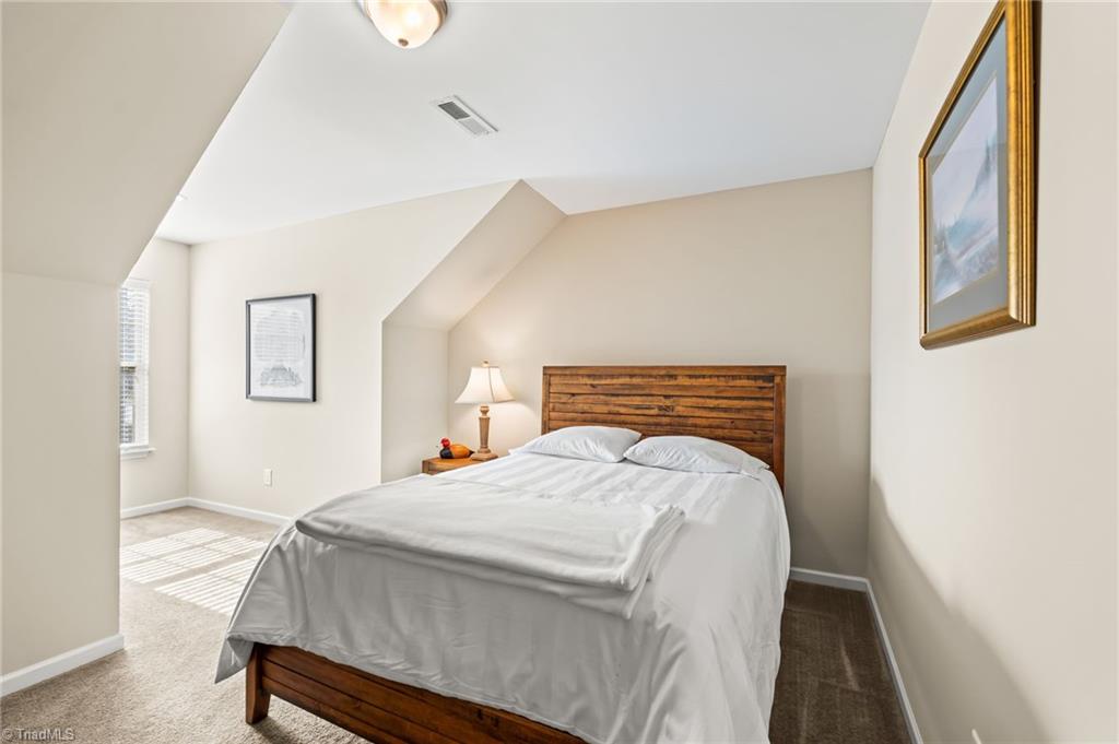 3057 Renaissance Parkway Jamestown, NC 27282 - Photo 21 of 31 Such a great bedroom on the upper level.