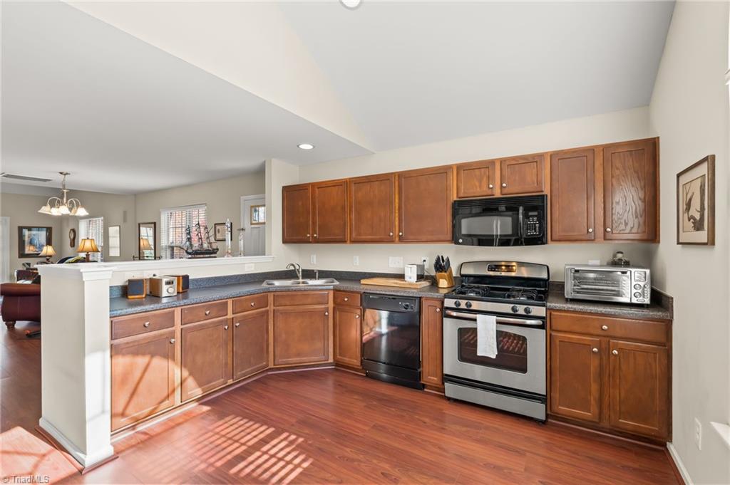3057 Renaissance Parkway Jamestown, NC 27282 - Photo 6 of 31 Such a large kitchen, with room for a small bistro table.