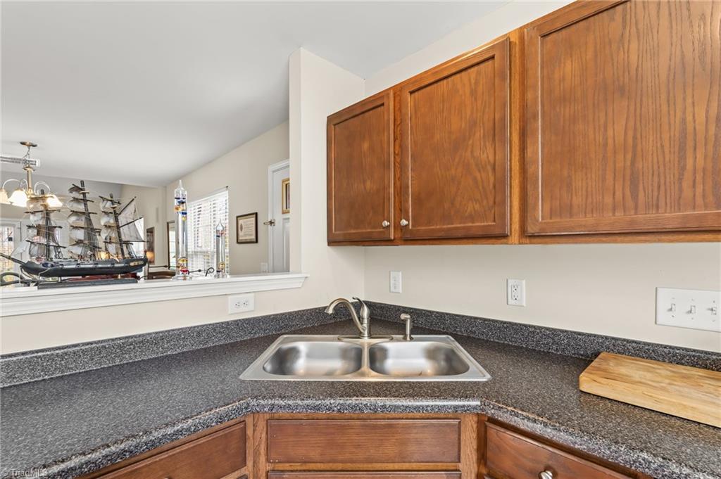 3057 Renaissance Parkway Jamestown, NC 27282 - Photo 8 of 31 Never miss what is going on the in the great room when you have this open concept.