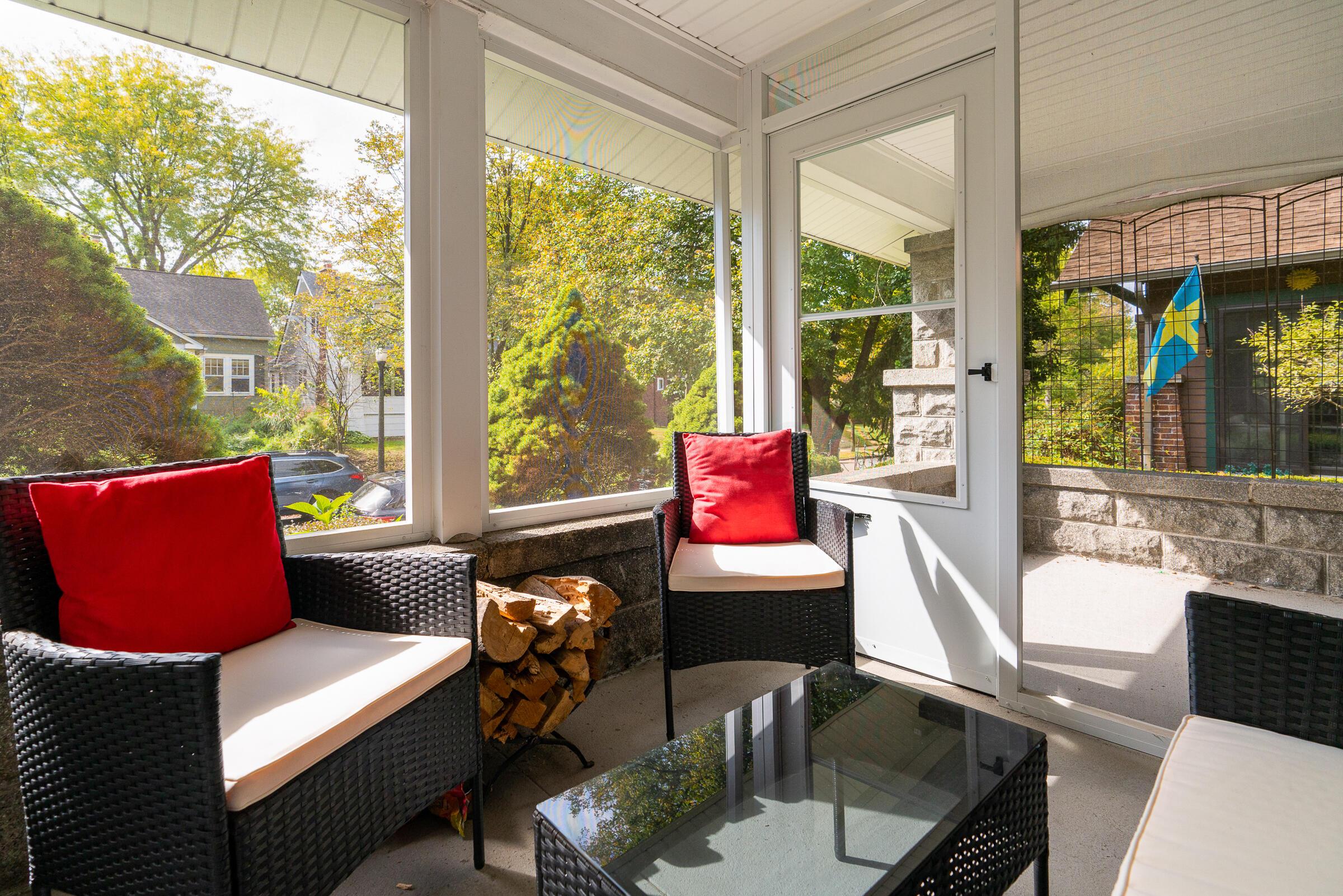 Delightful screened porch #1 overlooks the front yard.