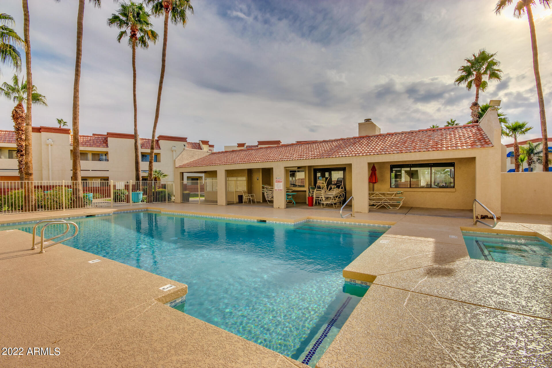 12123 West Bell Road, Unit 159 Surprise, AZ 85378 - Photo 14 of 21 a front view of a house with garden
