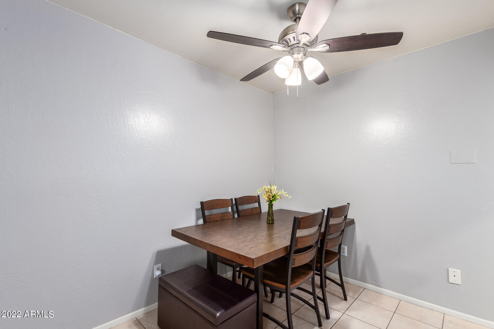 12123 West Bell Road, Unit 159 Surprise, AZ 85378 - Photo 7 of 21 a view of a workspace with a table and chairs