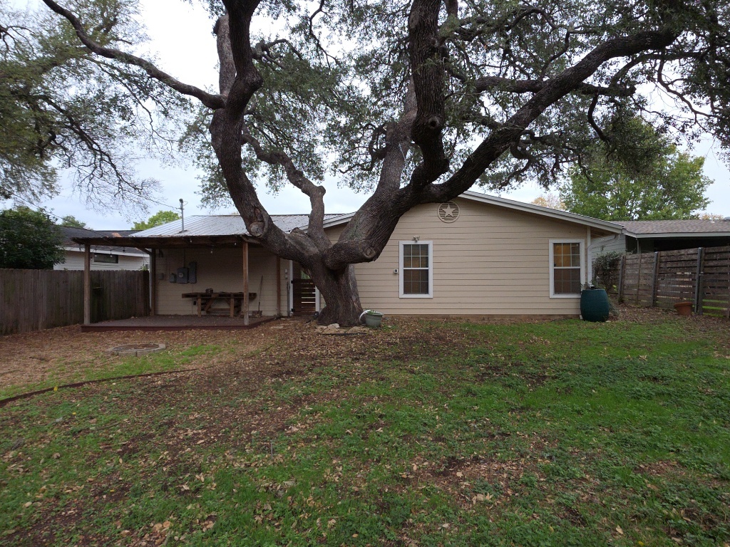 4707 Philco Drive Austin, TX 78745 - Photo 17 of 19 Back of house with a fenced backyard