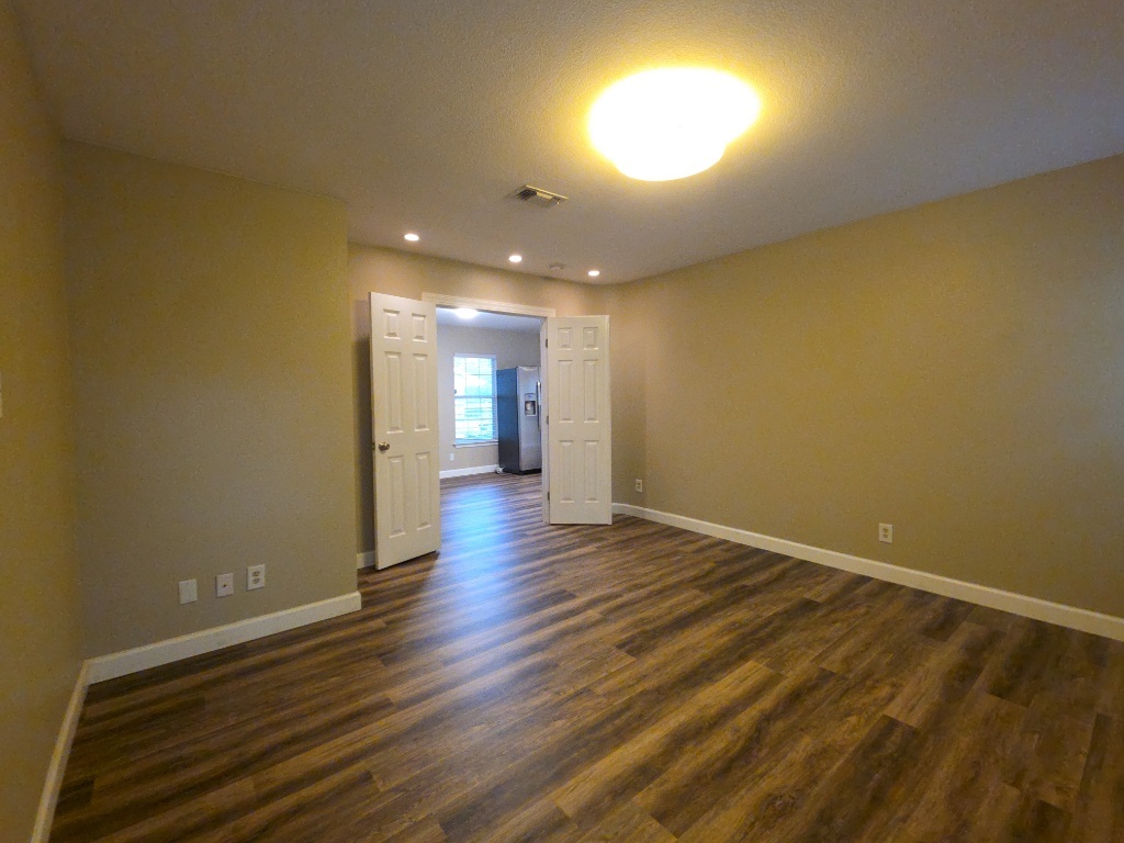 4707 Philco Drive Austin, TX 78745 - Photo 8 of 19 Primary bedroom with double door entry