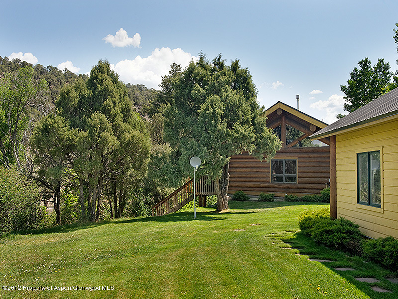 1637 Emma Spur Basalt, CO 81621 - Photo 17 of 35 a view of a house with a backyard