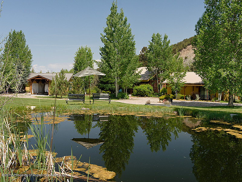 1637 Emma Spur Basalt, CO 81621 - Photo 2 of 35 a view of a lake with houses