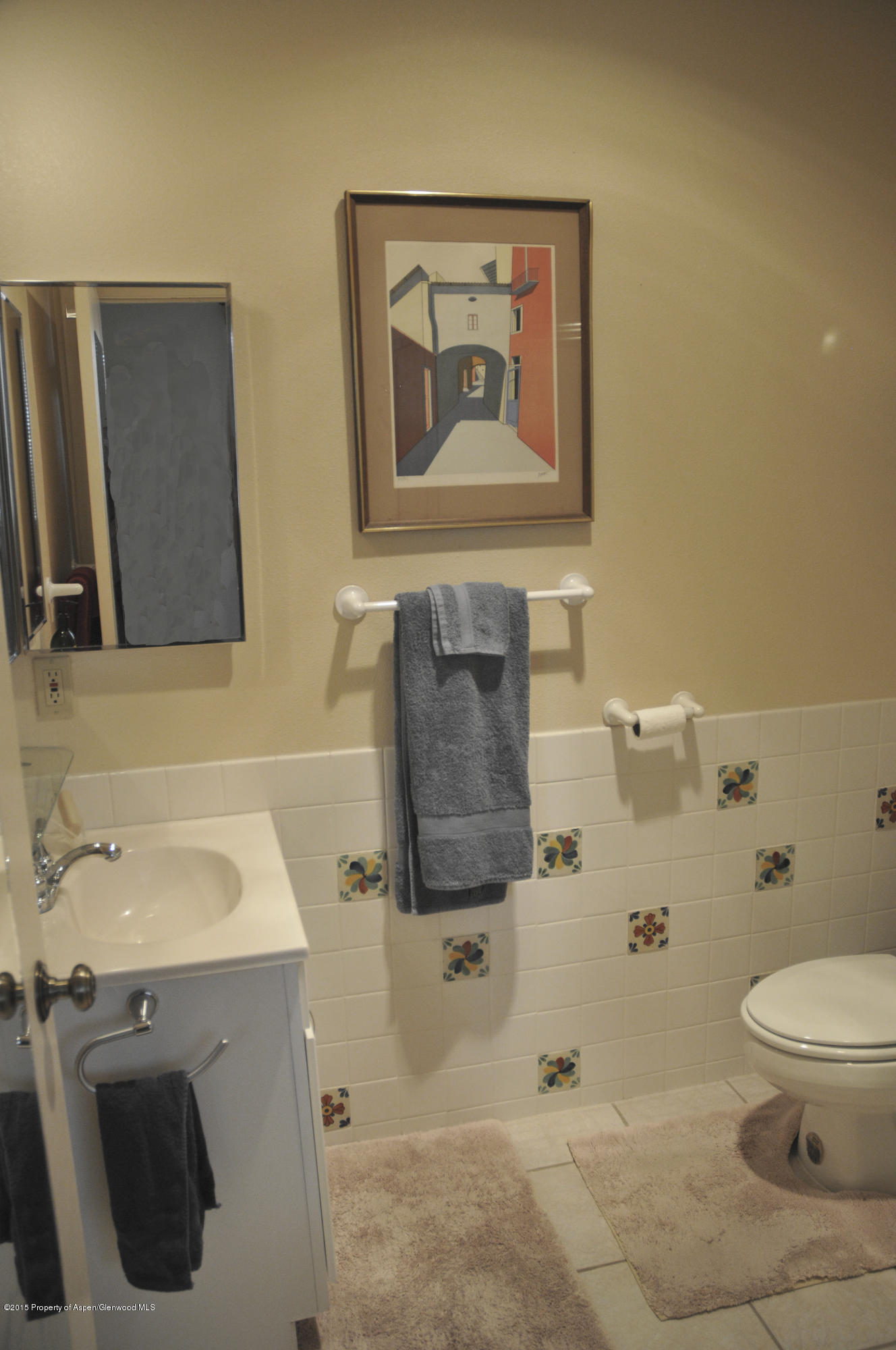 1637 Emma Spur Basalt, CO 81621 - Photo 31 of 35 a bathroom with a sink and mirror with toilet