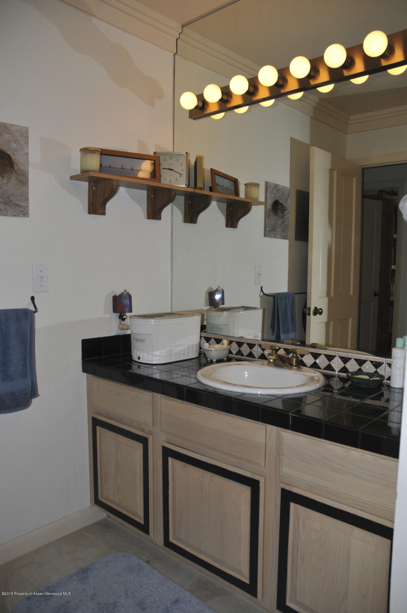 1637 Emma Spur Basalt, CO 81621 - Photo 33 of 35 a kitchen with cabinets and stainless steel appliances