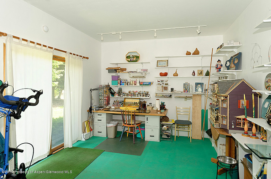 1637 Emma Spur Basalt, CO 81621 - Photo 8 of 35 a room with furniture and a flat screen tv