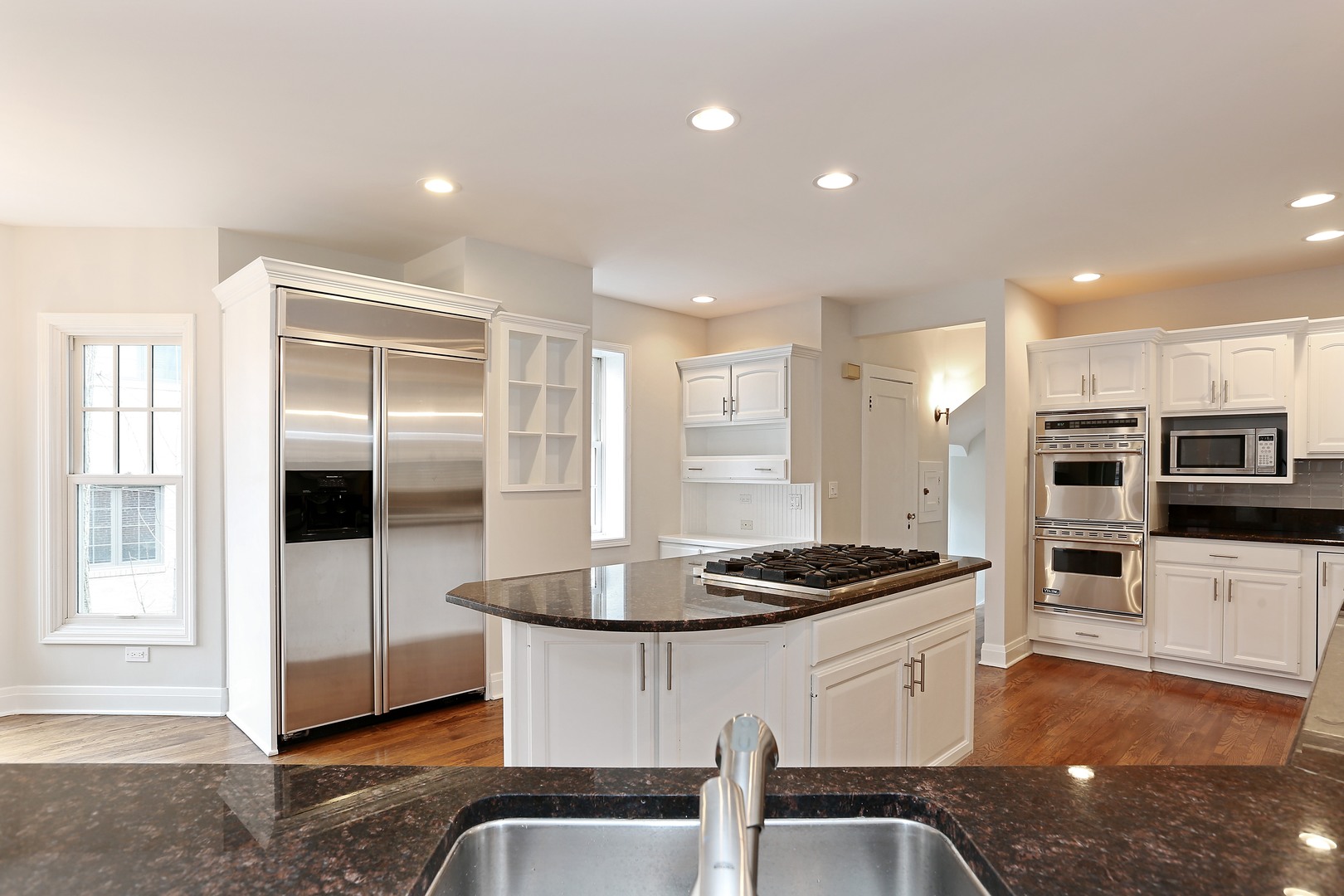 330 Radcliffe Way Hinsdale, IL 60521 - Photo 14 of 27 a kitchen with stainless steel appliances kitchen island granite countertop a stove and a refrigerator