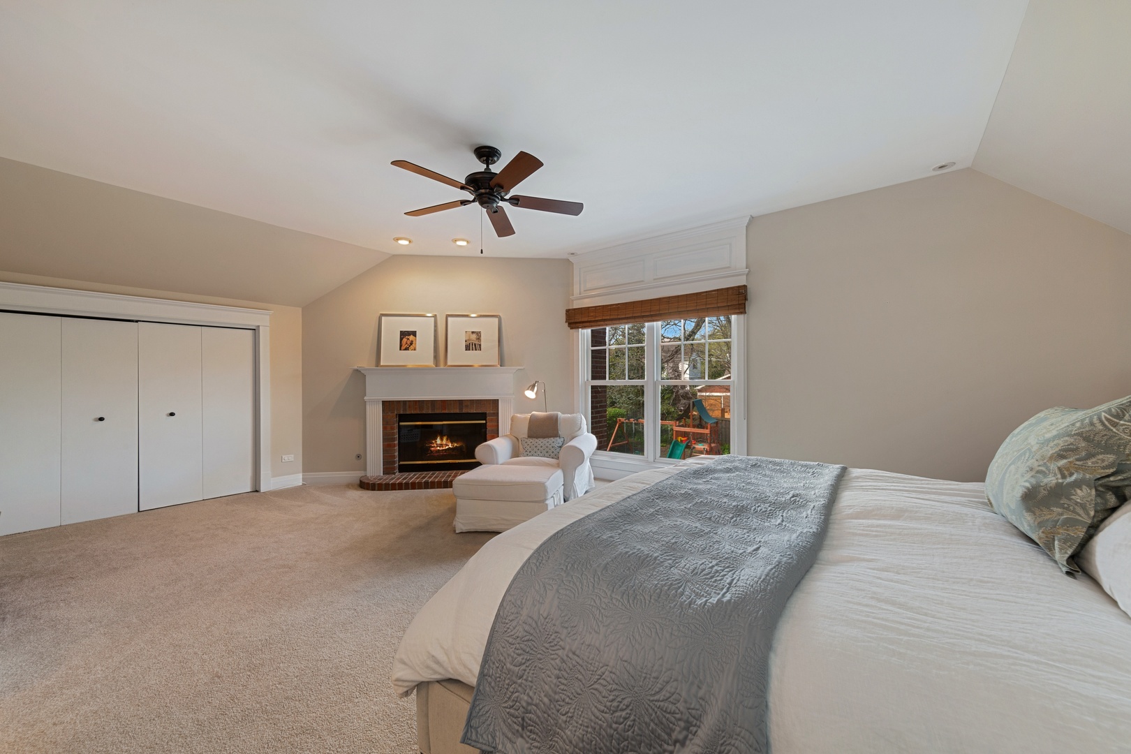330 Radcliffe Way Hinsdale, IL 60521 - Photo 19 of 27 a bed room with a bed and a fireplace