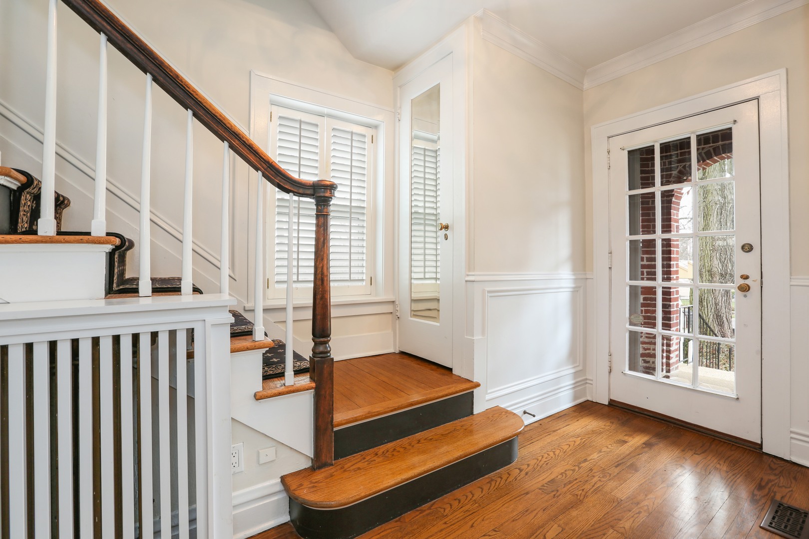 330 Radcliffe Way Hinsdale, IL 60521 - Photo 4 of 27 a view of an empty room with wooden floor and windows
