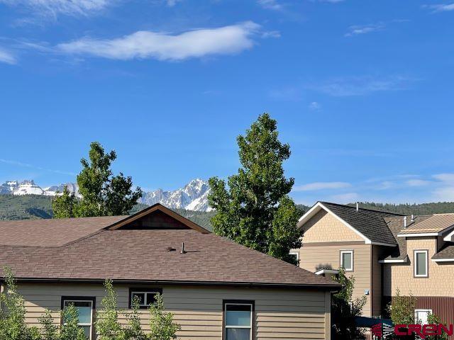 413 Kismet Street Ridgway, CO 81432 - Photo 4 of 9 a front view of a house with a yard